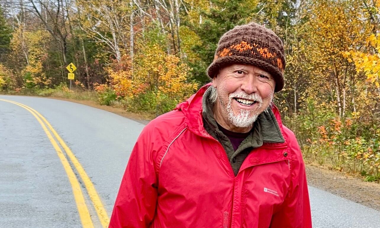 Michael Nikas smiling outdoors